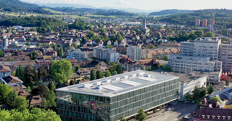 View of Berner Oberland with Inselspital campus in the foreground.